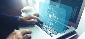 An AI illustration overlaid to a person using a laptop, from Getty Images.