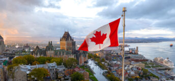 The Canadian flag flying over Old Quebec City