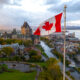 The Canadian flag flying over Old Quebec City