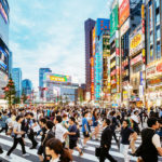 Crowds of people crossing the street in Tokyo, Japan