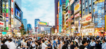 Crowds of people crossing the street in Tokyo, Japan