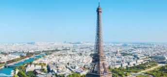 a view of Paris with the Eiffel tower in the foreground